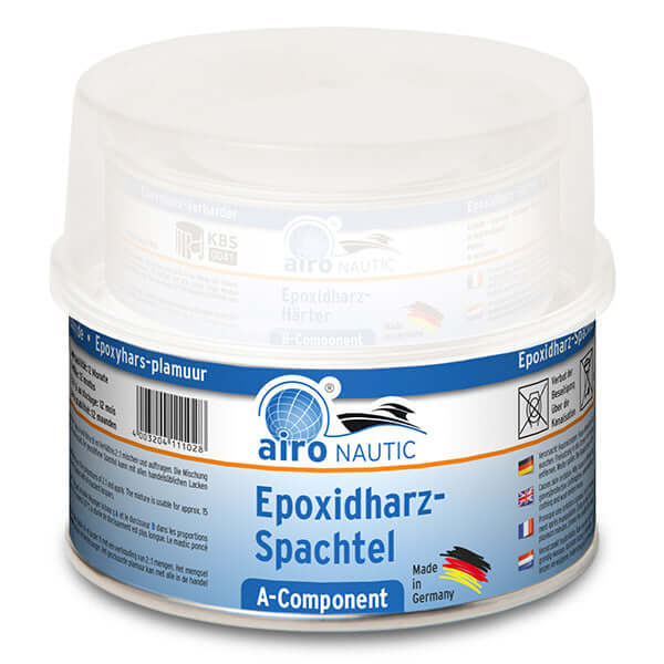 Nautic Epoxy Filler Light Grey + Spatula in a round container with a clear lid for boat repairs.