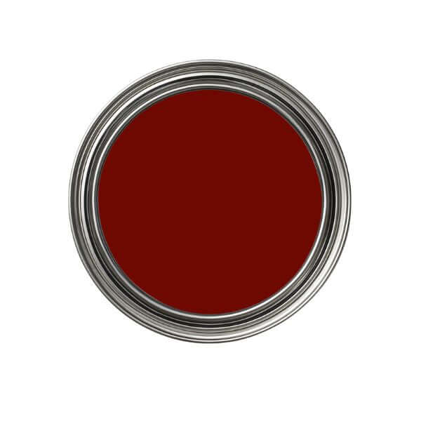 Red paint can lid on a white background