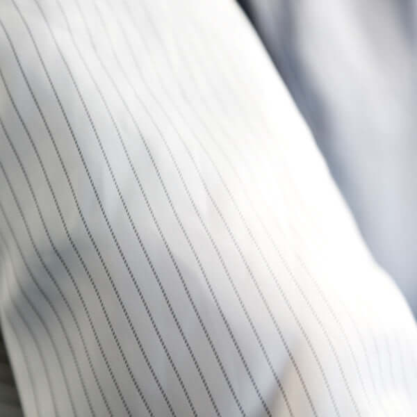 Close-up of Mipa Premium Paint Overall fabric with fine stripes, showcasing its durable and water-repellent quality.