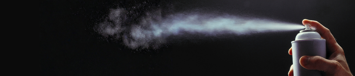 1K & 2K Paints What are the differences. A hand holding a spray can, illustrating the concept of 1K vs 2K paints application