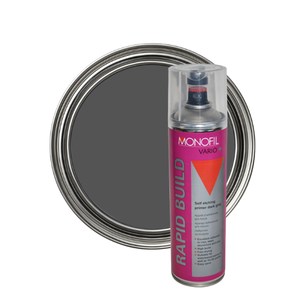 Spray paint can labeled 'Monofil' next to a paint tray with gray paint